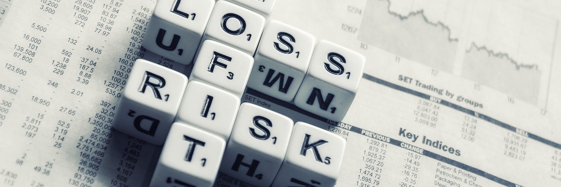 dices-over-newspaper-2656028_1920