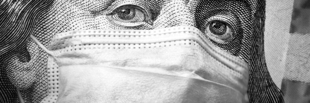 COVID-19 coronavirus, finance and crisis concept, US president Franklin`s eyes and face mask on 100 dollar money bill. Corona virus affects global stock market. dólar en 2021