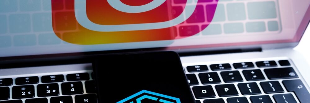 Nft,Logo,Seen,On,Smartphone,And,Blurred,Instagram,Logo,On